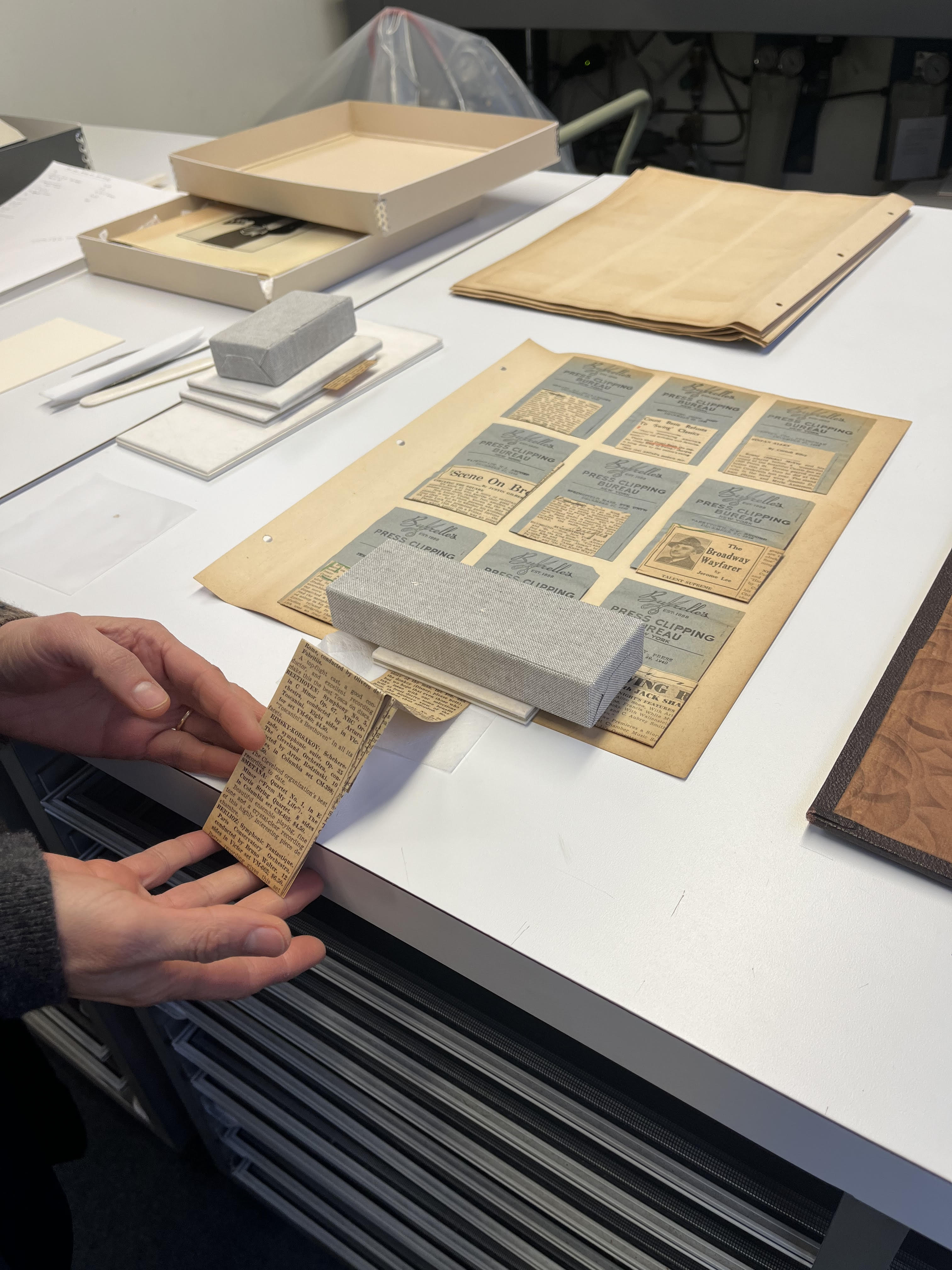 Book Conservator Amber Hares working on a Count Basie scrapbook