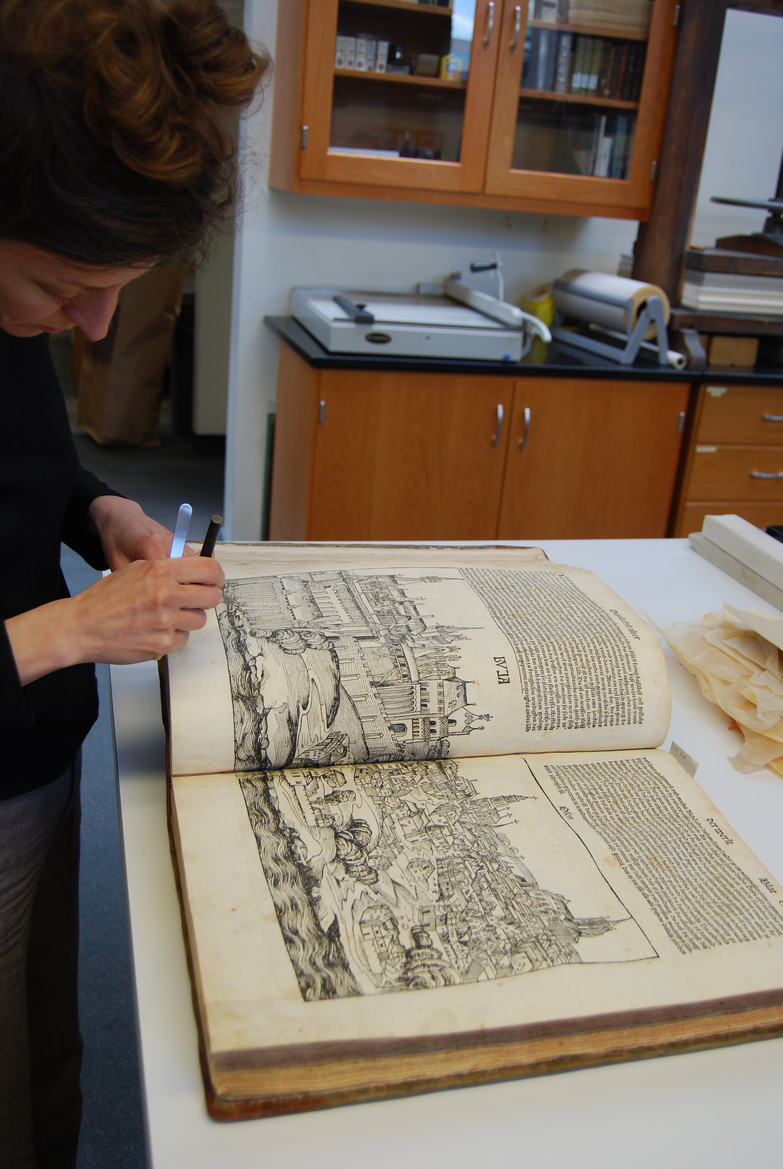 Surface cleaning the pages of the manuscript
