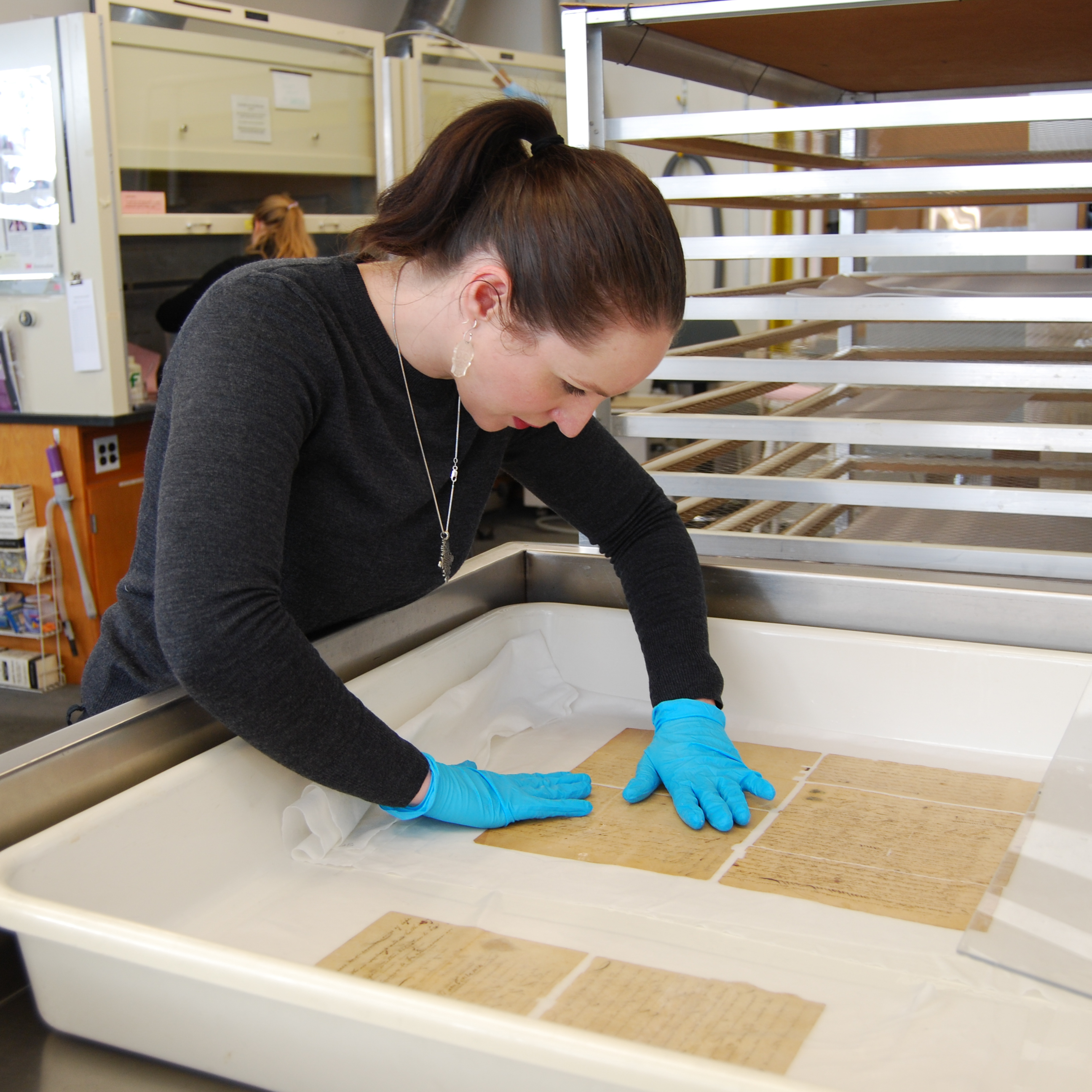 Conservator washes document