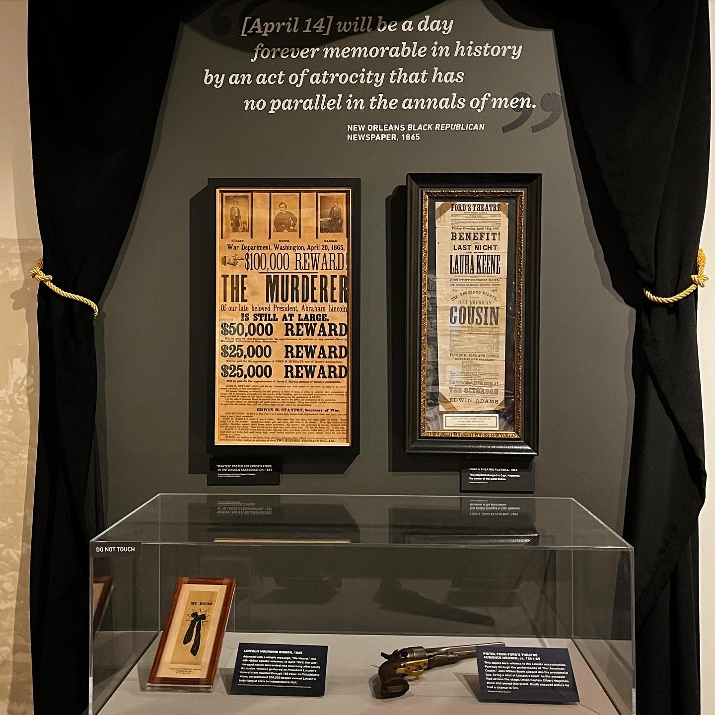 An original John Wilkes Booth wanted poster, which was treated and housed at CCAHA, in a display with other related objects at the National Constitution Center