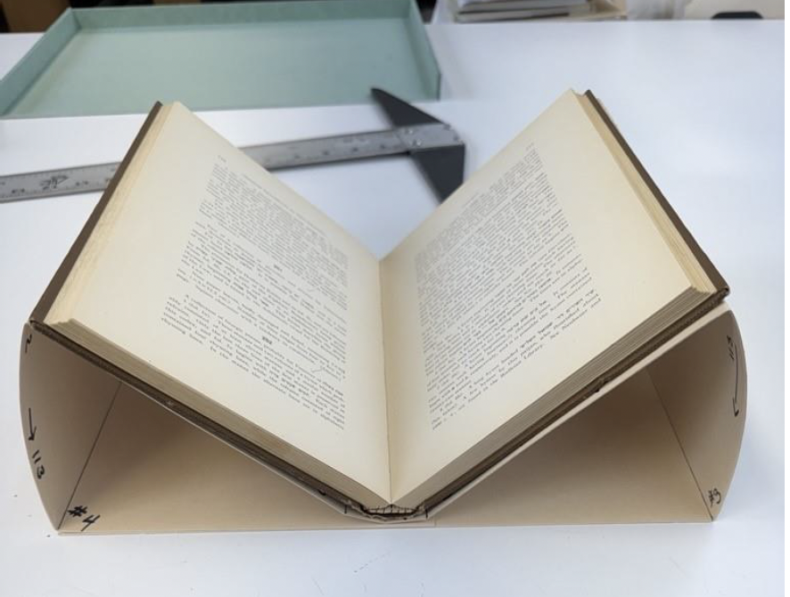 Custom book cradle.