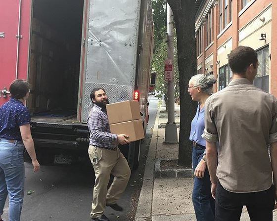 CCAHA staff unloading a shipment from St. Olaf College 
