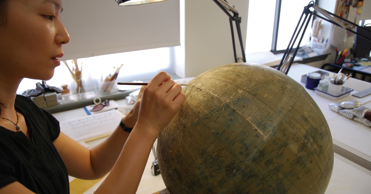 Inpainting Einstein's globe