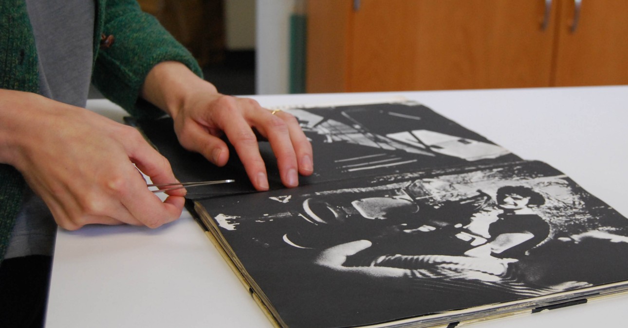 Resewing the binding of a pop up book