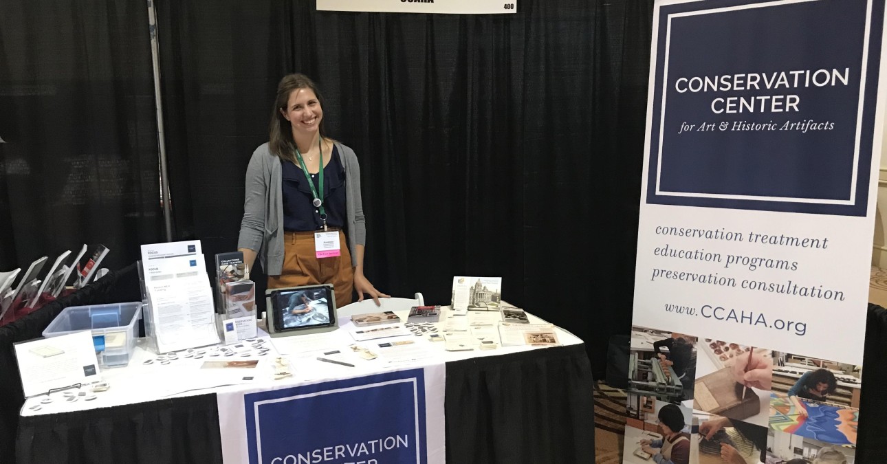 DHPSNY Program Manager Anastasia Matijkiw poses at the CCAHA exhibit table during last month's AASLH Annual Meeting in Philadelphia