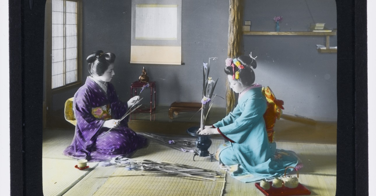 Lantern slide entitled Girls Arranging Flowers