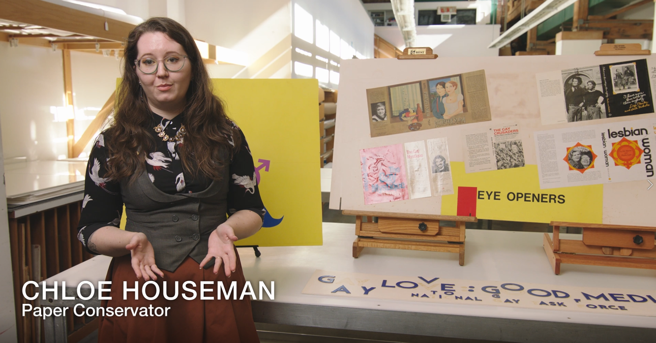 Still frame of a video of Paper Conservator Chloe Houseman explaining the Barbara Gittings Exhibition Booths from the William Way Archives