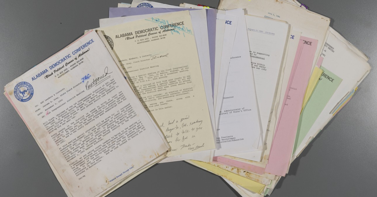 An assortment of colorful pages from a collection of documents belonging to the Alabama State University Archives