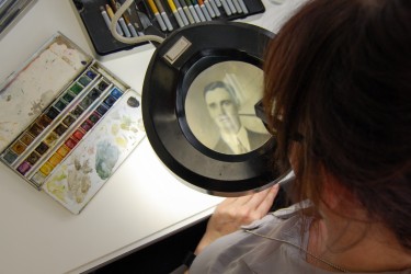 Inpainting a photograph with a magnifier