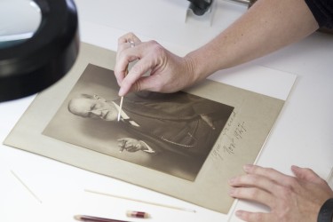 Removing a stain from a photograph of Freud