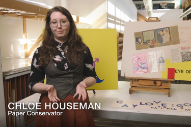 Still frame of a video of Paper Conservator Chloe Houseman explaining the Barbara Gittings Exhibition Booths from the William Way Archives